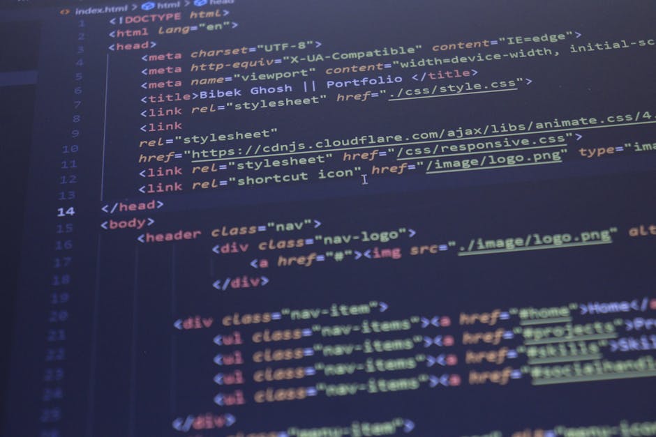 A photograph of a computer screen displaying lines of HTML code with syntax highlighting in shades of blue, pink, and white. The code includes tags such as <!DOCTYPE html>, <html>, <head>, <meta>, <ti
